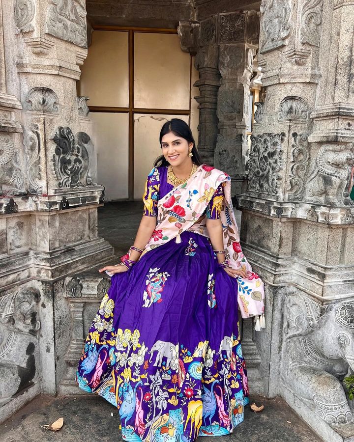 Vibrant Purple Ethnic Lehenga with Animal Motif Design and Floral Dupatta