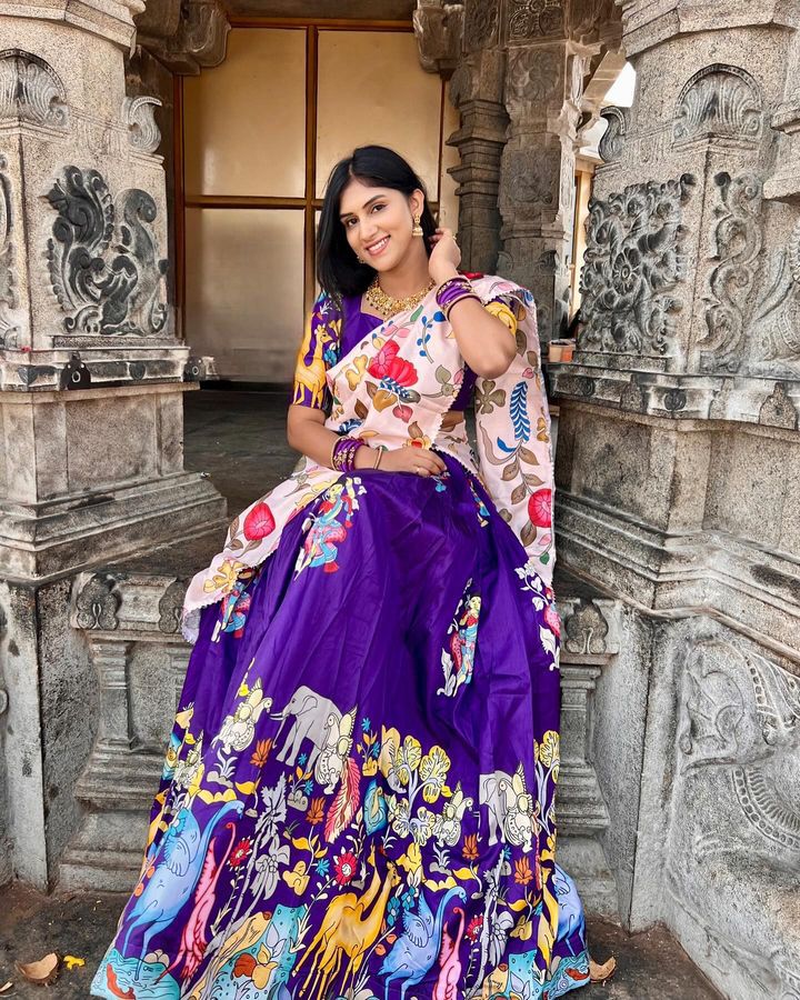 Vibrant Purple Ethnic Lehenga with Animal Motif Design and Floral Dupatta