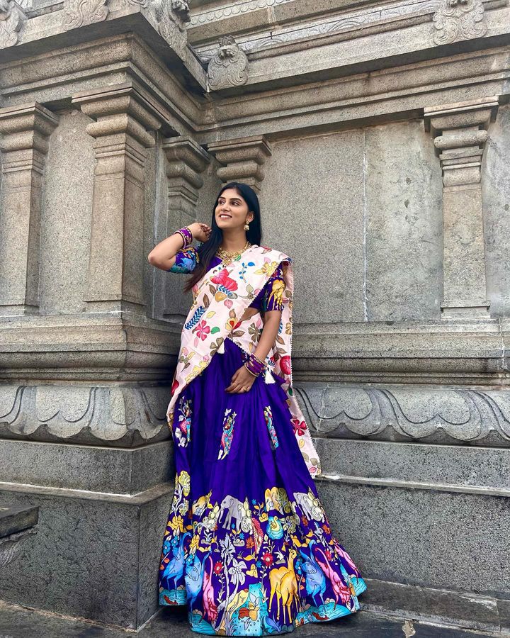 Vibrant Purple Ethnic Lehenga with Animal Motif Design and Floral Dupatta