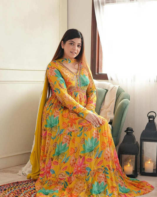 GLAMOUROUS YELLOW ALIYA CUT WITH INTRICATE HANDWORK, STONEWORK DORIWORK AND MIRROR WORK