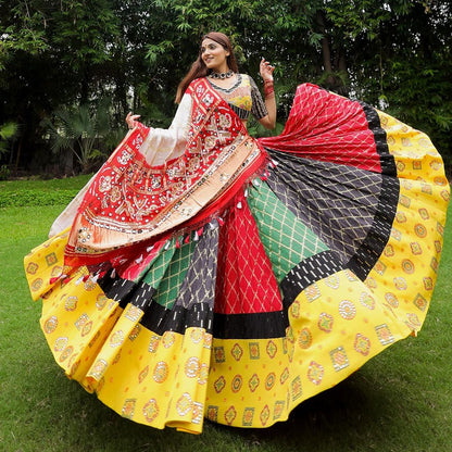 Vibrant Yellow and Red Bandhani Lehenga Choli with Traditional Mirror Work