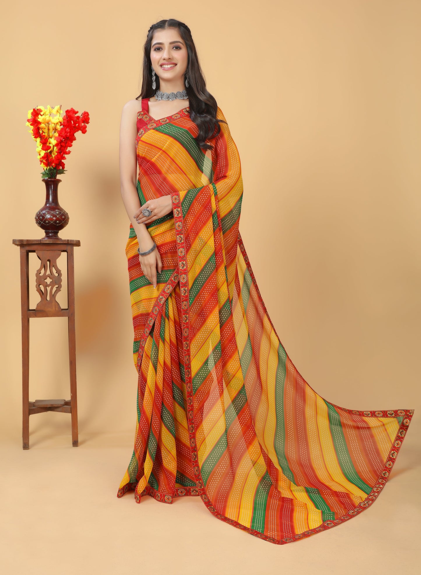 Beautiful Designed Lace Bordered Printed Georgette Saree with Muslin Blouse Piece